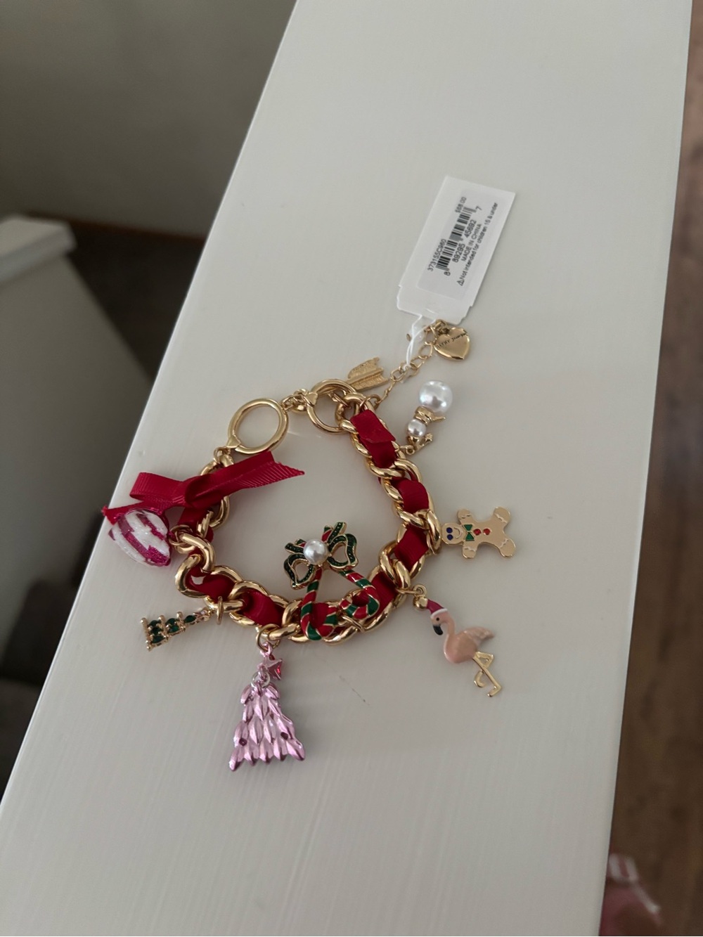 Betsy Johnson  Chain Charm Bracelet with Red Ribbon and Festive Charms